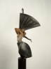 Bronce y piedra artificial<br>Measures: 45x100x35 cm<br>Series: 12 units.