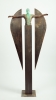 Bronce and steel<br>Measures: 66x107x16 cm<br>Series: 10 units.